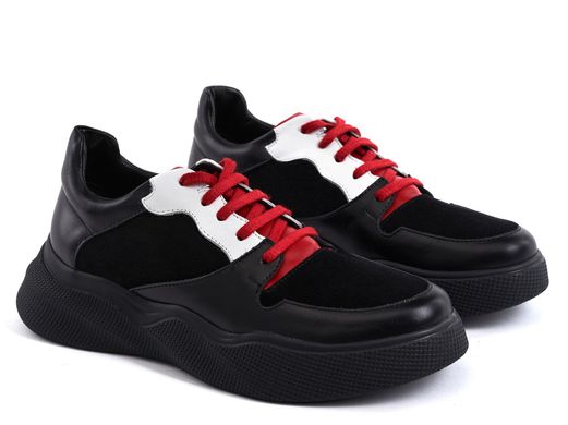 Кросівки з червоною шнурівкою фото