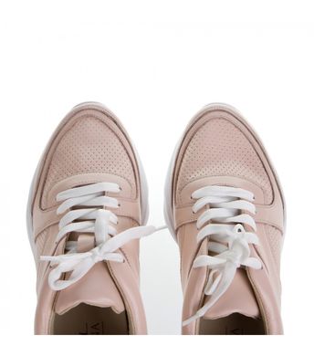 Рожеві кросівки з перфорацією фото