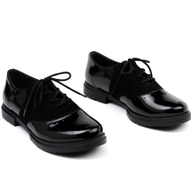 Туфлі з чорного лаку фото
